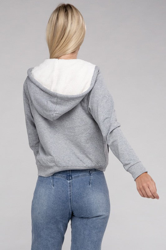 Heather Grey cropped zip-up hoodie with fuzzy trim, pockets, and long sleeves.