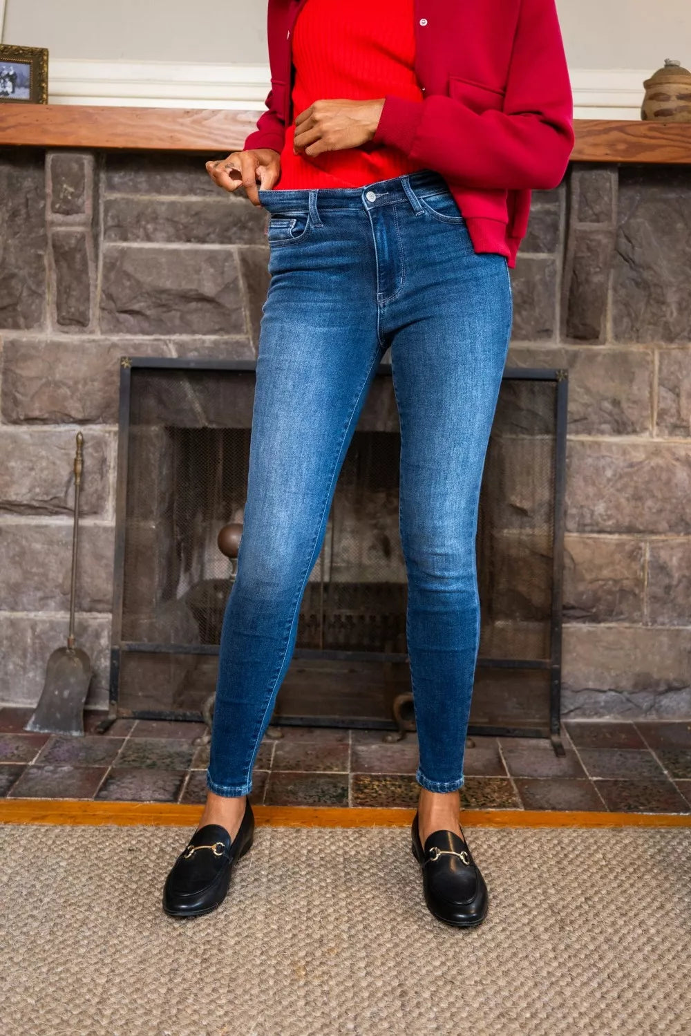 Model walking in Glenda Washed Thermal Skinny Jeans to show stretch and slim fit.