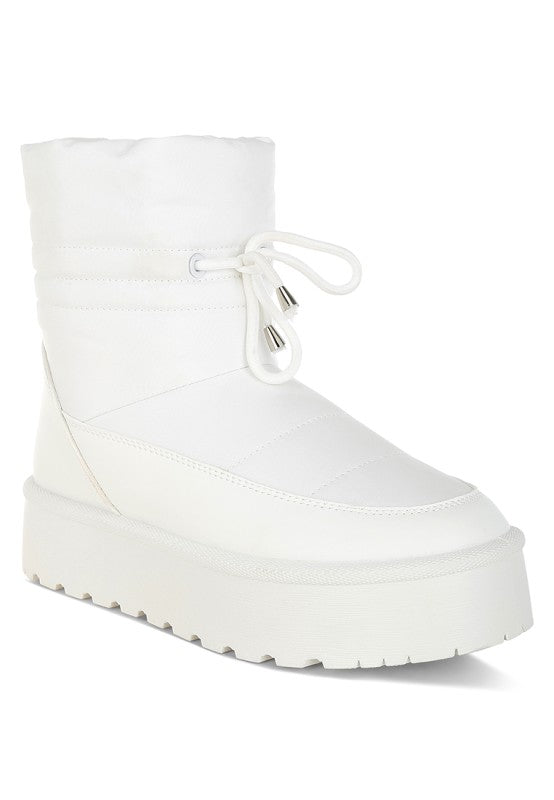 White Pacos Snow Boots front angle with chunky lug sole design.