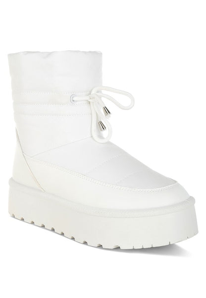 White Pacos Snow Boots front angle with chunky lug sole design.