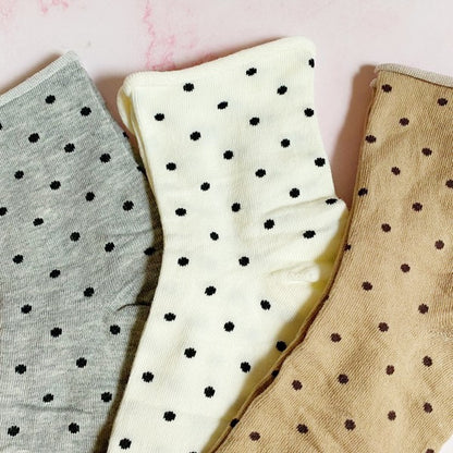Close-up of Precious Polka Dot Socks showing playful dot pattern and soft knit texture.