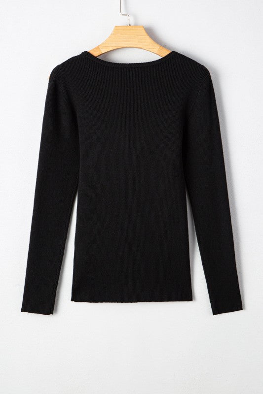 Back of Amaya Ribbed Knit Cold Shoulder Sweater on hanger.