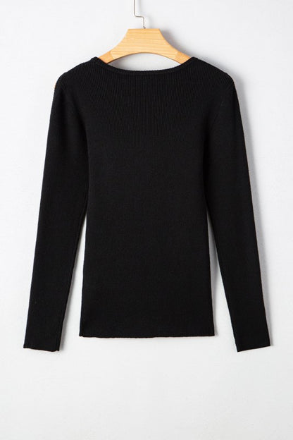 Back of Amaya Ribbed Knit Cold Shoulder Sweater on hanger.