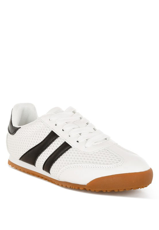 Front angled view of white Blaster lace-up sneaker with black stripes, mesh upper, and lug sole by Rag Company.