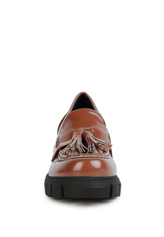 Front view of Jonah Platform Loafers in tan with rounded toe and tassels