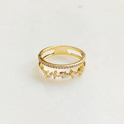 Colette Jeweled Ring flat lay of gold band with sparkling cubic zirconia accents