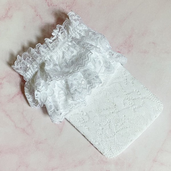 Folded white 80’s Lace Socks with lace pattern and doubled lace ankle trim.