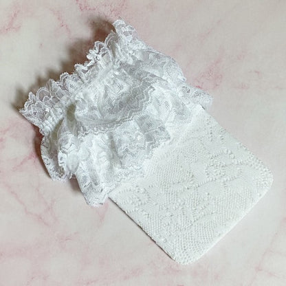 Folded white 80’s Lace Socks with lace pattern and doubled lace ankle trim.