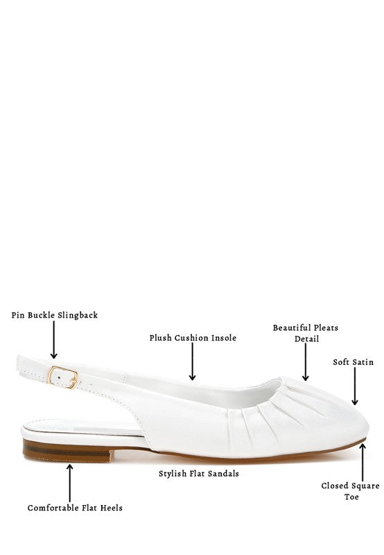 White satin slingback shoes with square toe, adjustable buckle strap, flat heel, and plush cushion insole.