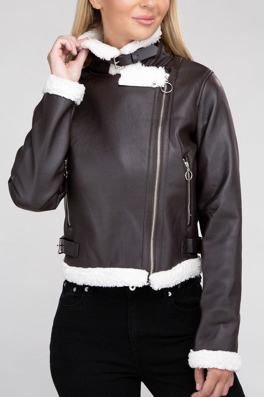 Brown vegan leather jacket with cozy teddy trim, zipper closure, and side pockets.