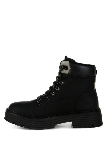 Side view of Black Boskoff Lace-Up Chunky Ankle Boots with platform heel, lace-up detail, and durable sole.