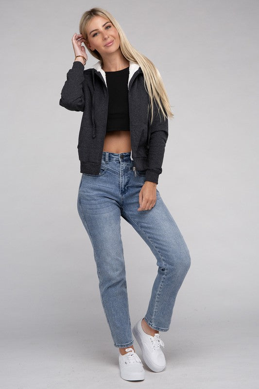 Charcoal cropped zip-up hoodie with fuzzy trim, pockets, and long sleeves.