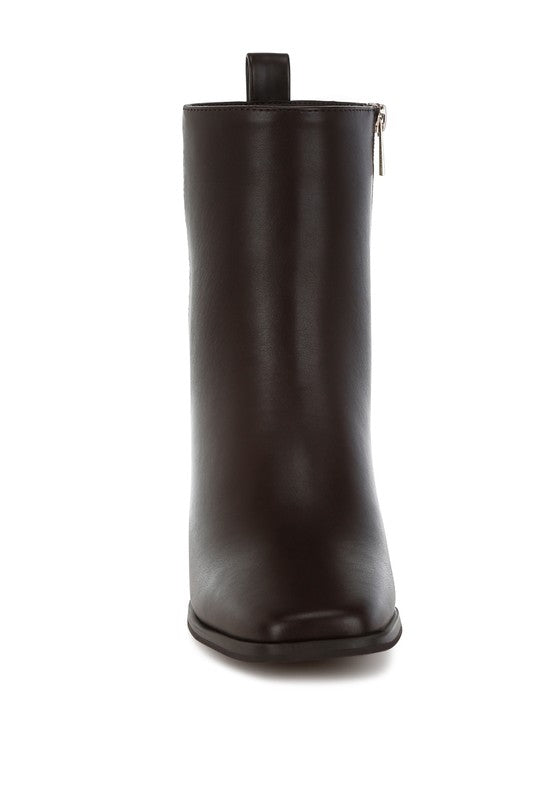 Front view of Brown Muskox Square Toe Boots highlighting square toe design and minimalist silhouette.