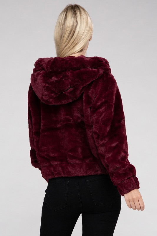 Cropped Burgundy zip-up fluffy teddy hoodie with a drawstring hood, long sleeves, and front pockets.