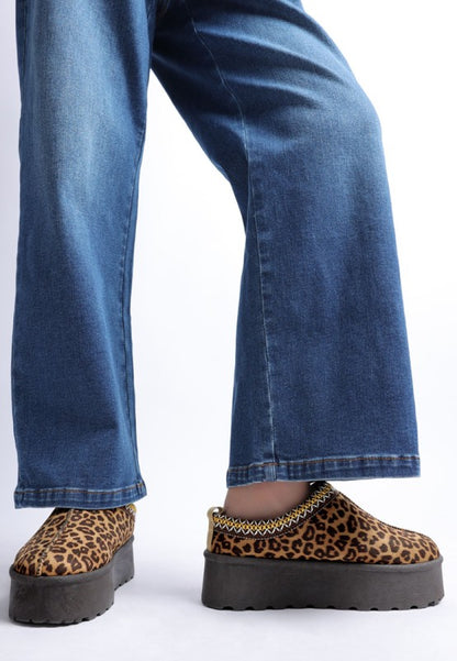 Ottawa Leopard Platform Slip-Ons close-up showing anti-skid sole and textured upper.