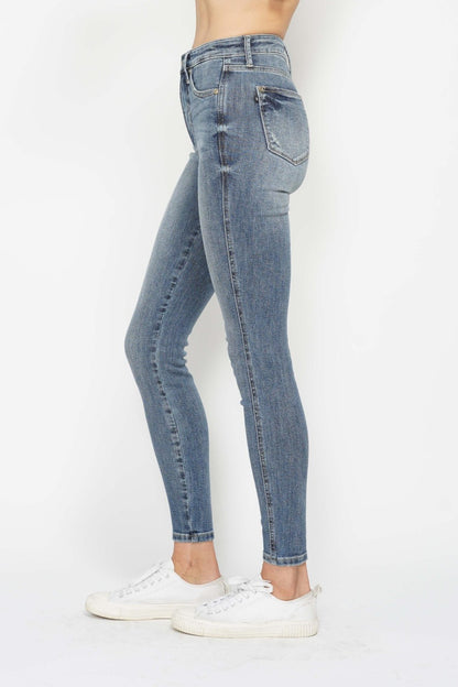 Tummy Control Contrast Wash Skinny Jeans by Judy Blue in medium wash. High waist with tummy control panel, skinny leg silhouette, and moderate stretch for comfort and style. Versatile and flattering
