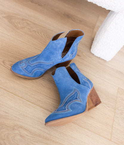 Journee Blue Suede Ankle Boots with western stitching, deep cutout design, and closed toe on 3-inch heel.