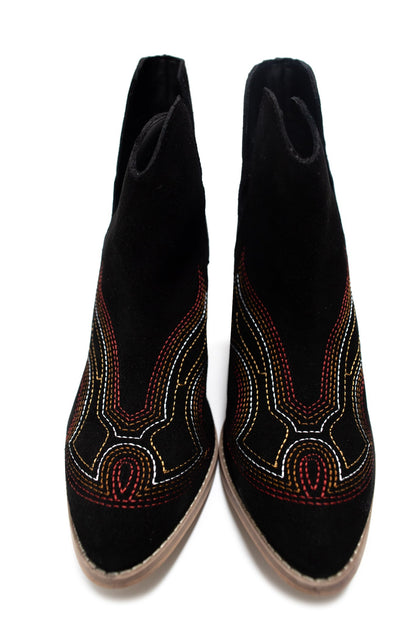 Journee Black Suede Ankle Boots showing western stitching, closed toe, and sleek silhouette.
