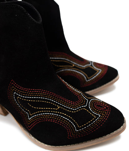 Close up of Journee Black Suede Ankle Boots showing suede texture and western-inspired stitching.