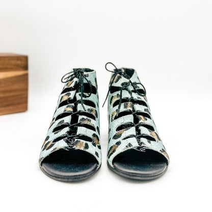 View of Nola Teal Leopard Sandals highlighting lace-up fit and gladiator-inspired look.