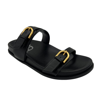Tess Double Strap Sandal front angle in black, showing gold buckle details and slip-on design