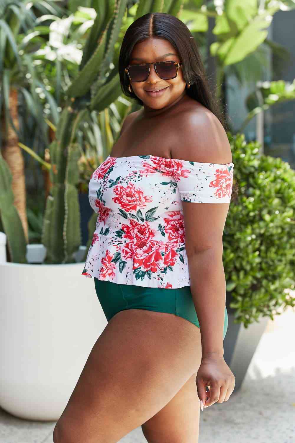 Peony print tankini swimsuit set with an off-shoulder top and ruffle details, paired with high-waisted bottoms.