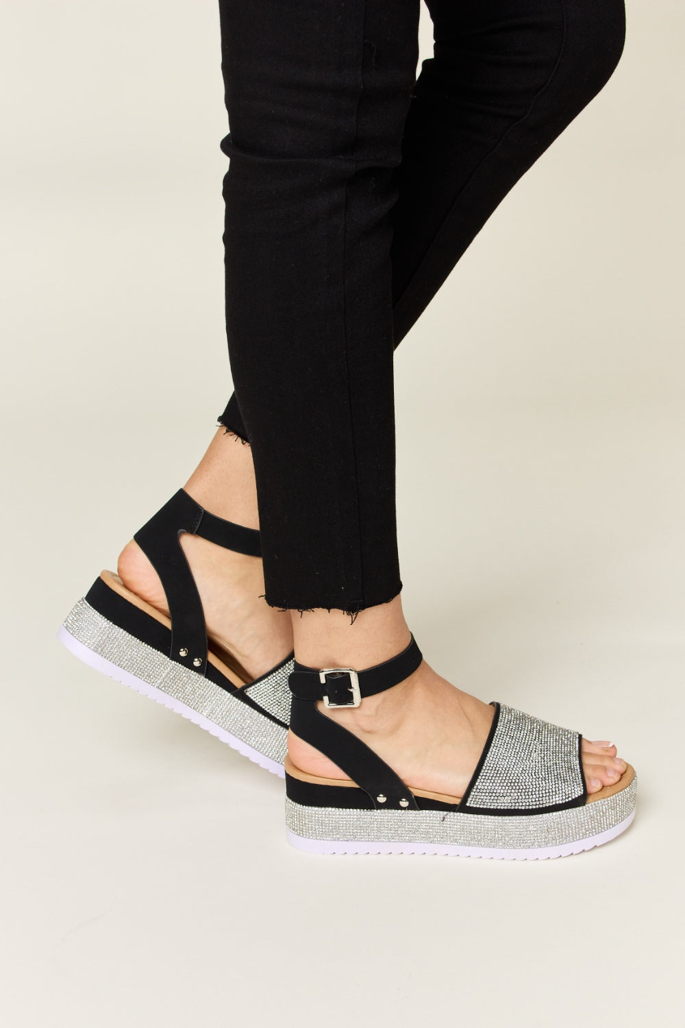 Mid-heel sandals with rhinestone-embellished buckles, made from PU material with a 2.3-inch heel height.