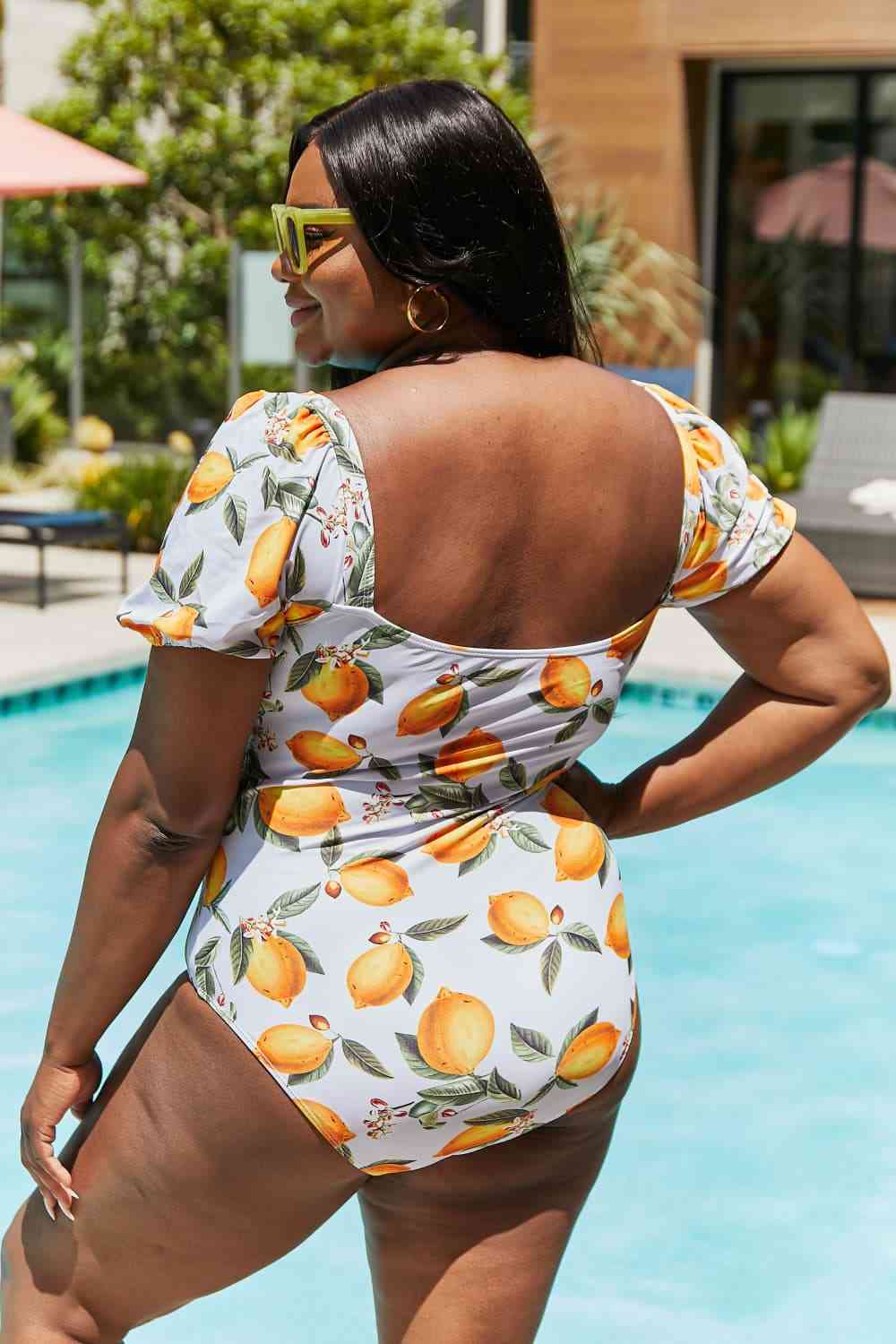 Trinity Beach Puff Sleeve One-Piece in Citrus Orange By Marina West Swim